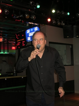 Paul the Rock God singing karaoke