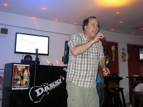 Paul the Rock God singing karaoke at Danny's Sports bar in Punta Cana, Dominican Republic